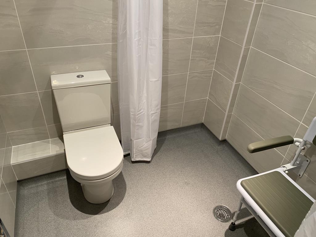 Graded floor former with polysafe flooring capped and coved