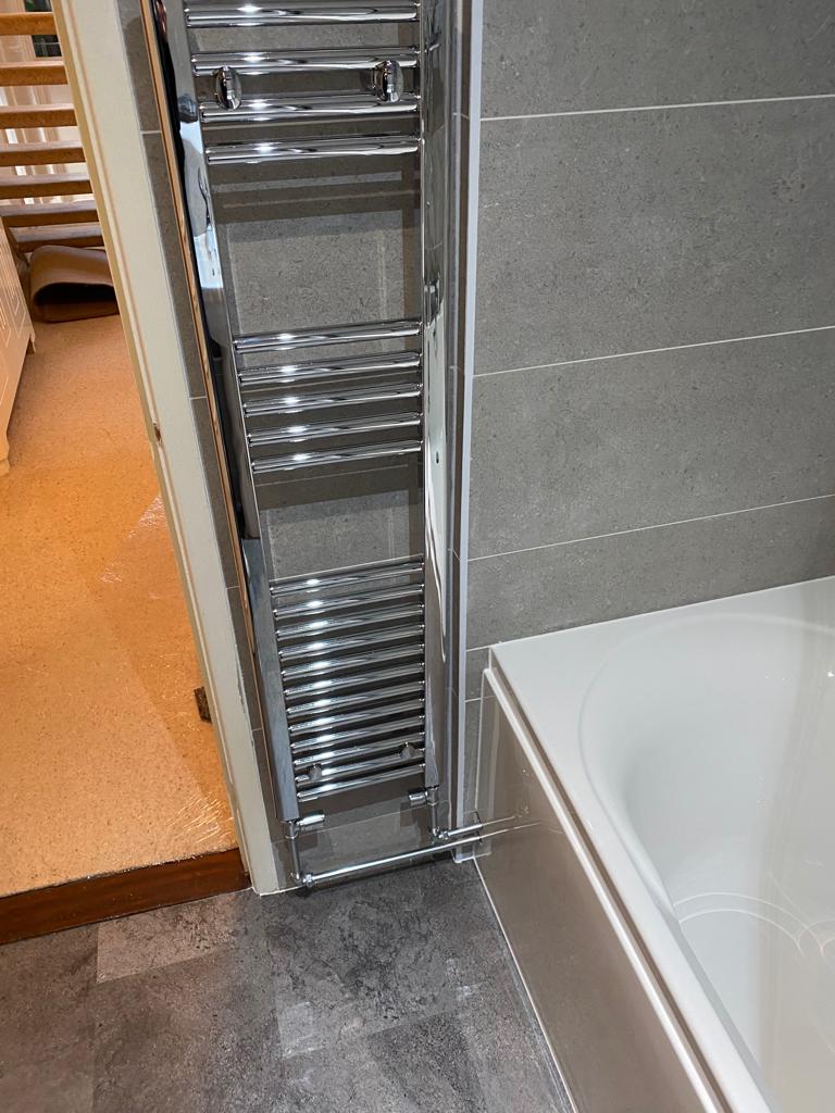 Warm base slim-line towel rail